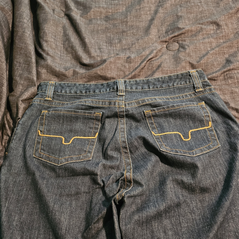 Kimes Ranch Dark Blue Straight Jeans with Gold Stitching. Betty